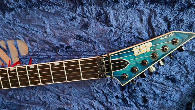 My 2025 ESP USA M-II FR Aquamarine sunburst.