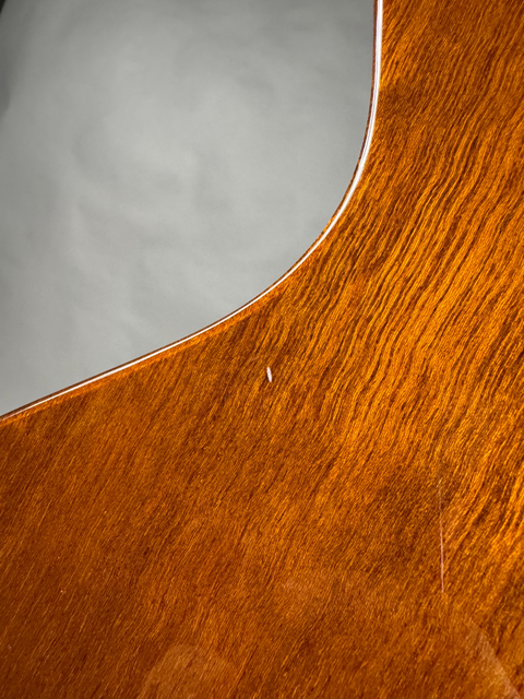 Small dings on the back of the body