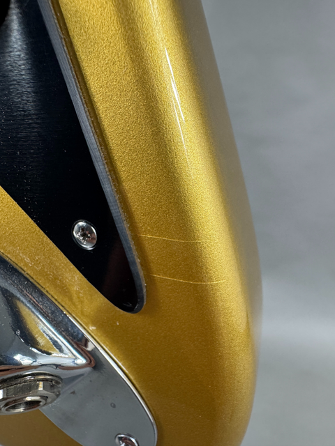 Finish cracks near the panel screw (lower part of the body)