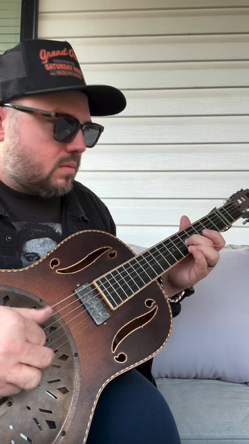 Trey Hensley sings with his Parr