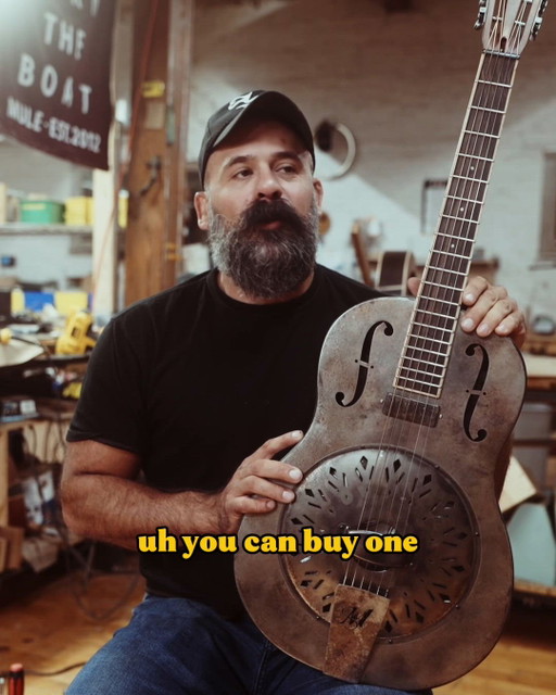 Monel Raffle Guitar and a story about Jazzfest