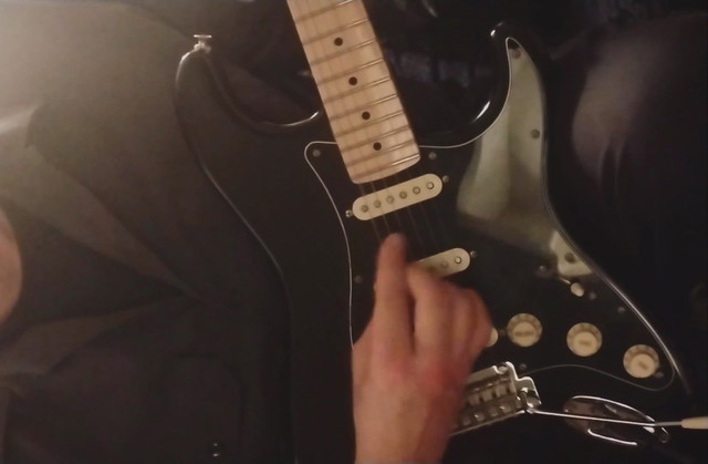 Deejay trying out Guitar parts for New project