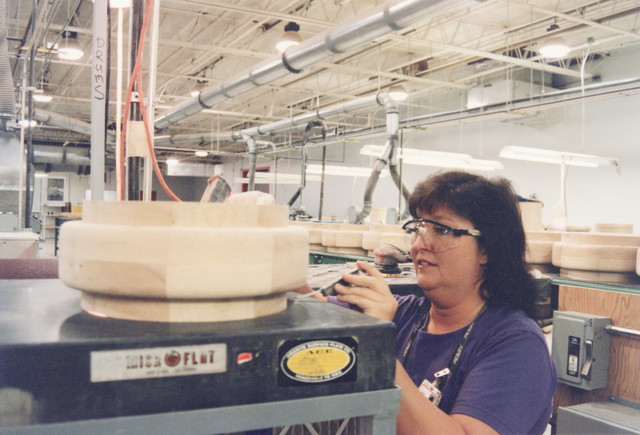 Inspecting snare drum for flatness on a granite block