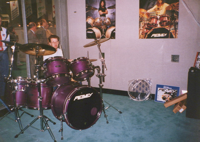 Me at Namm inside the Peavey booth.  Maybe second year?  The bass drum spurs pointed in year one.